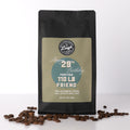 Coffee bag with a humorous birthday message reading 'Happy 29th Birthday from Your 110lb Friend' on a white background.