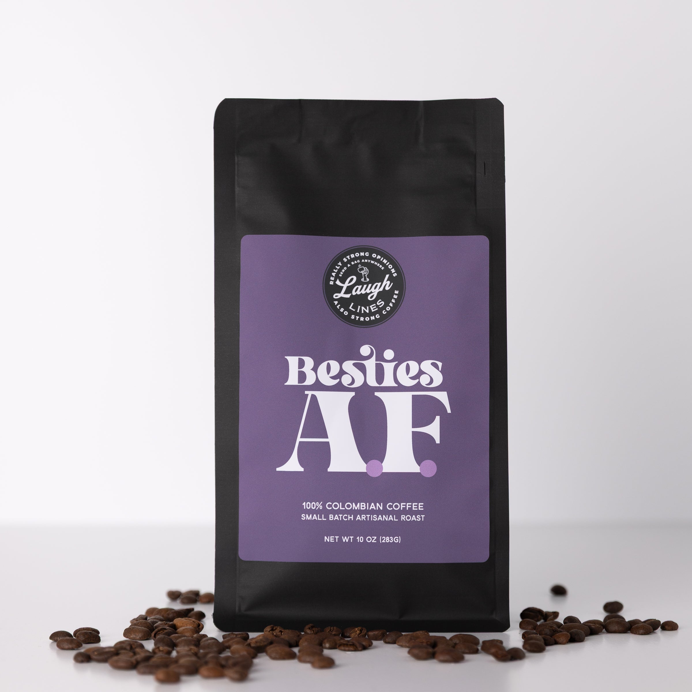 Coffee bag labeled 'Besties AF' with coffee beans on a white background