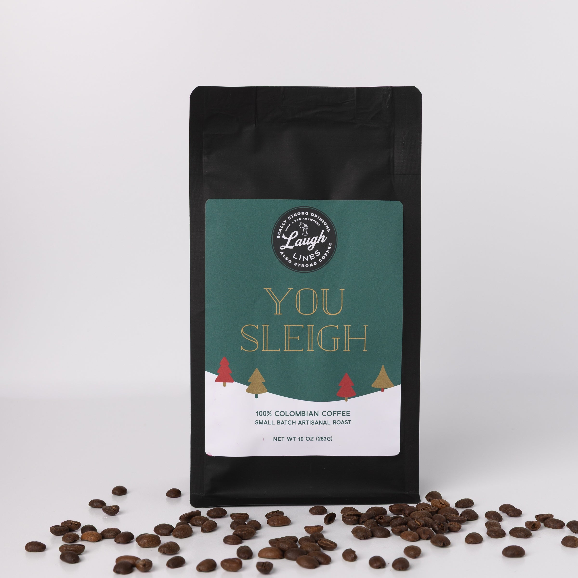 Coffee bag labeled 'You Sleigh' with coffee beans on a white background