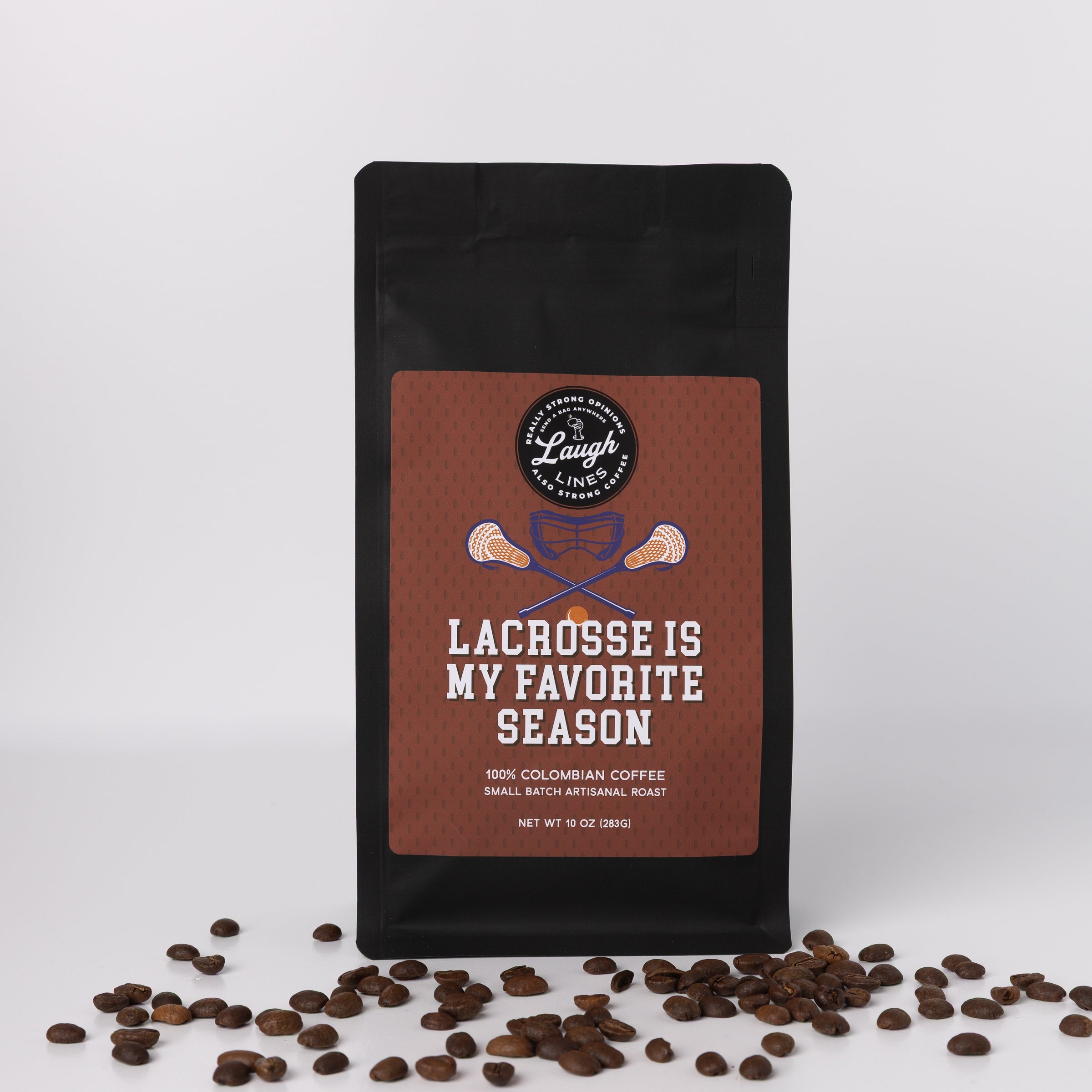Coffee bag with 'Lacrosse is My Favorite Season' text and coffee beans on a white background