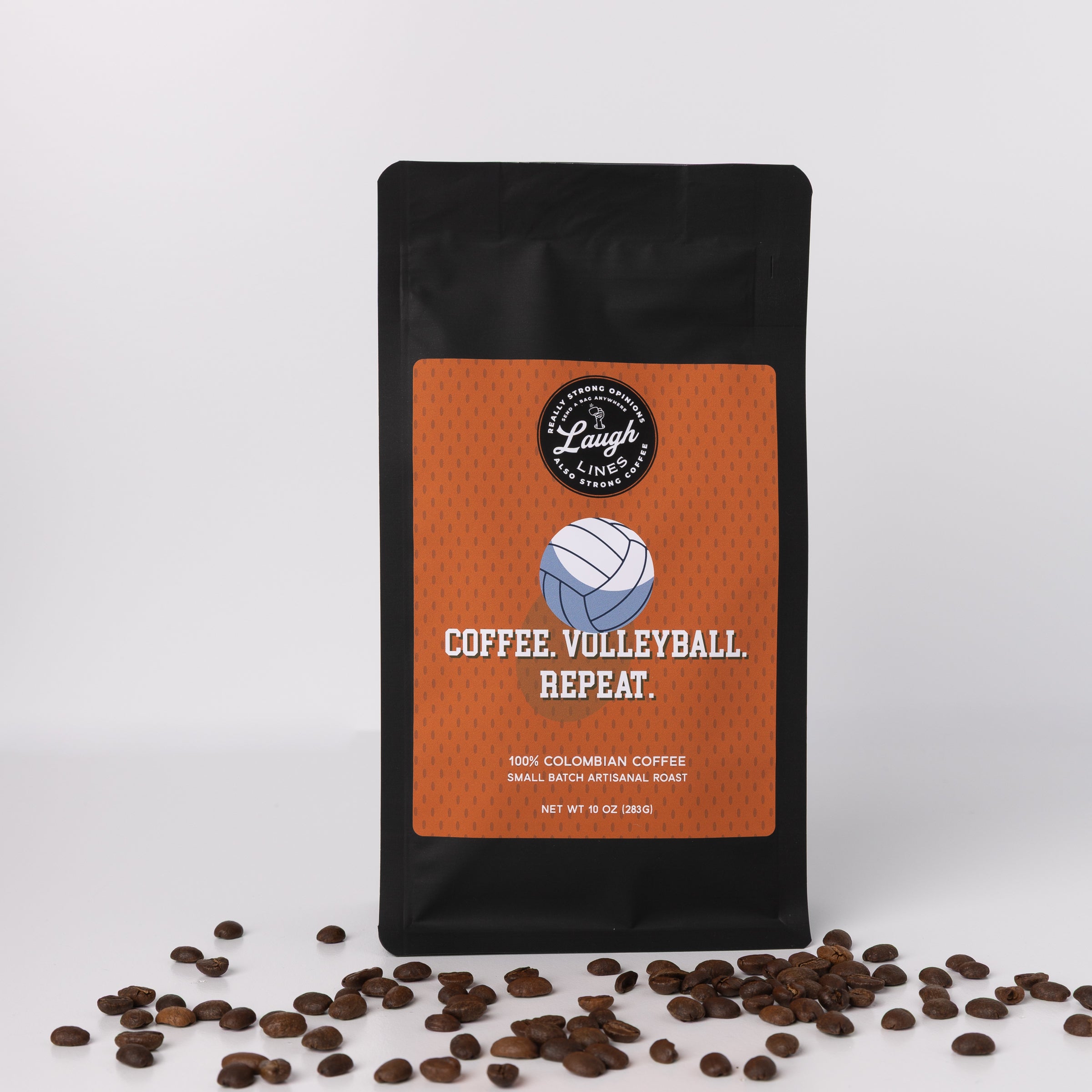 Coffee packaging with 'Coffee, Volleyball, Repeat' text and coffee beans on a white background